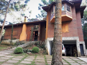 CASA EM MONTE VERDE CHARME E CONFORTO